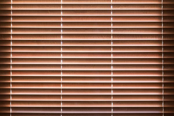 Wooden blinds with daylight filtering through