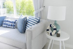 Beach style living room with table lamp